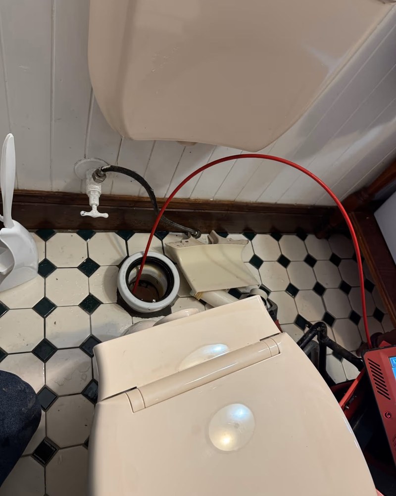 Toilet Lifted To Reach The Drain — Kerfoot Plumbing